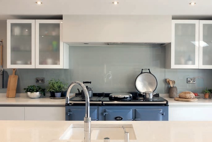 The AGA stands out against white cabinetry