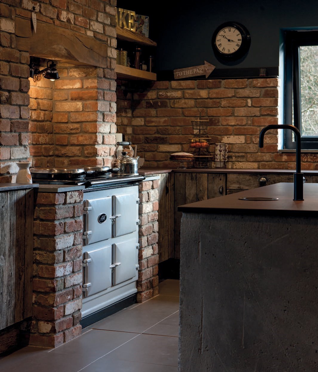 AGA Dual Control in Pearl Ashes with brick walls 
