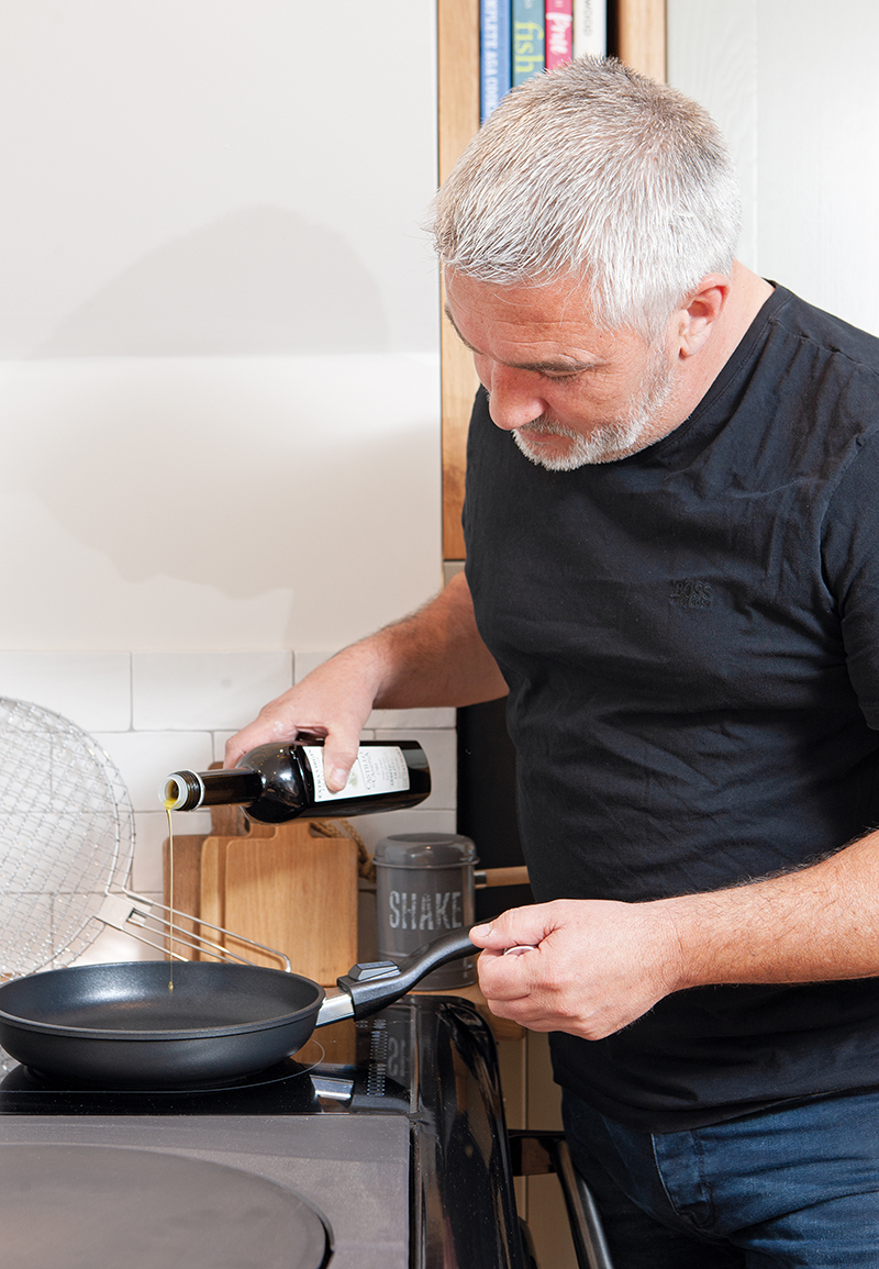 Paul Hollywood cooking on his AGA