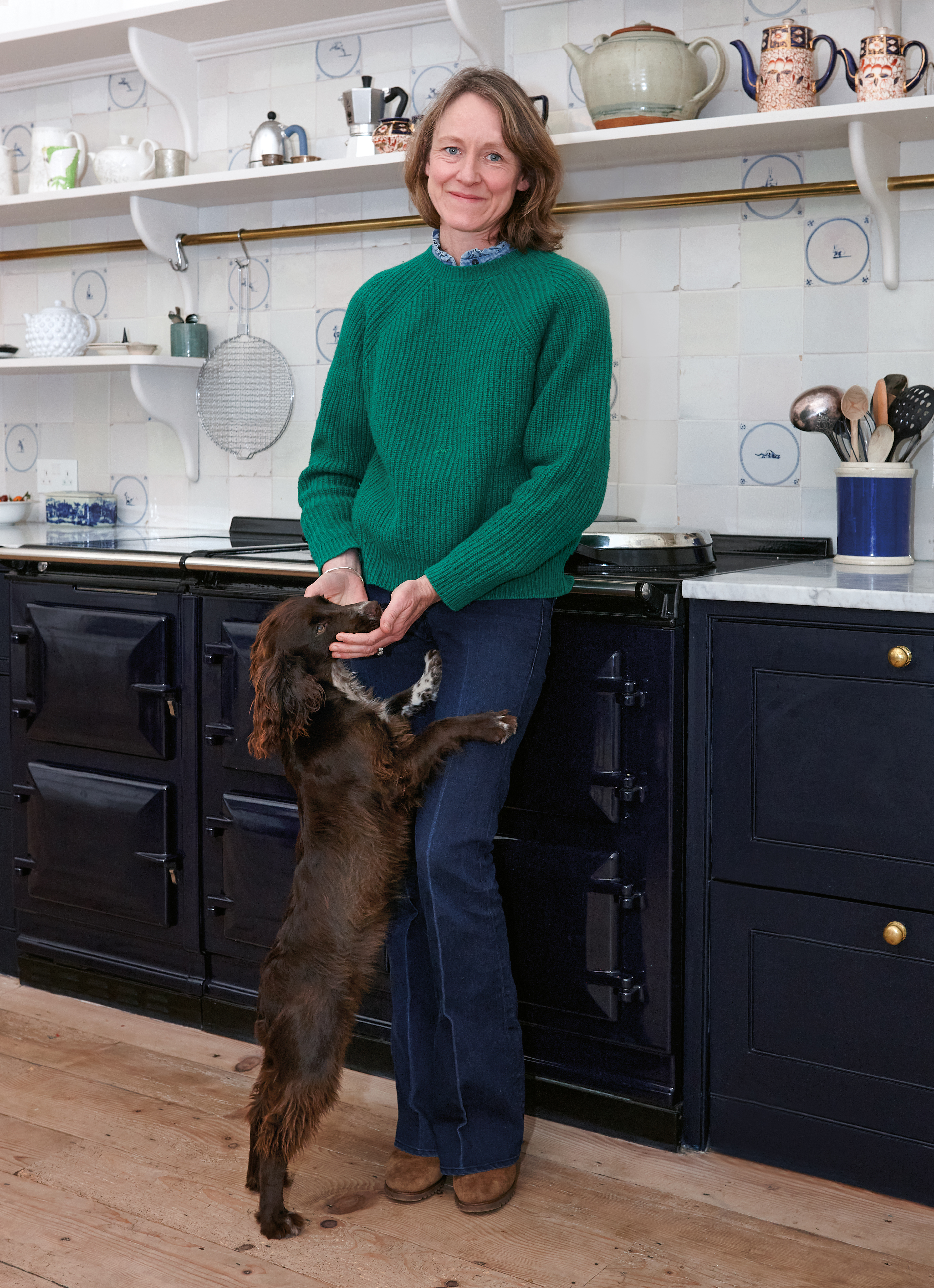 Hatta Byng standing in front of AGA with her puppy