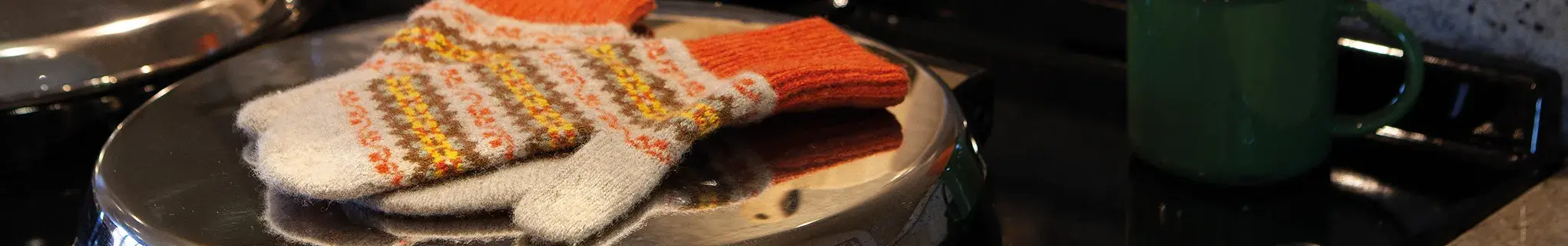 Gloves drying on the AGA hotplates