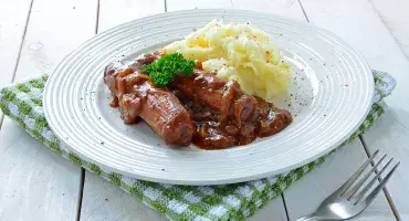 Sausages and Mash in Onion Gravy