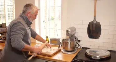 Paul Hollywood baking a flatbread at his home