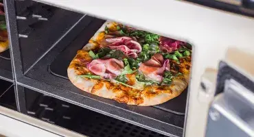 pizza cooking in the AGA roasting oven 