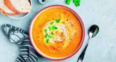 Sweet Potato and Butternut Squash Soup served in a bowl