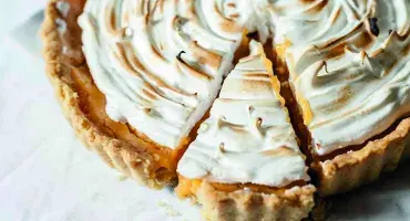 Lemon Meringue Pie with slice cut out