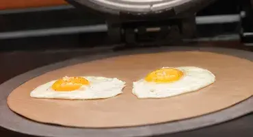 Frying eggs on the AGA hotplate