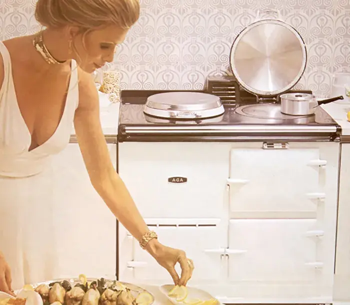 White 2-oven AGA from 1970s with lady