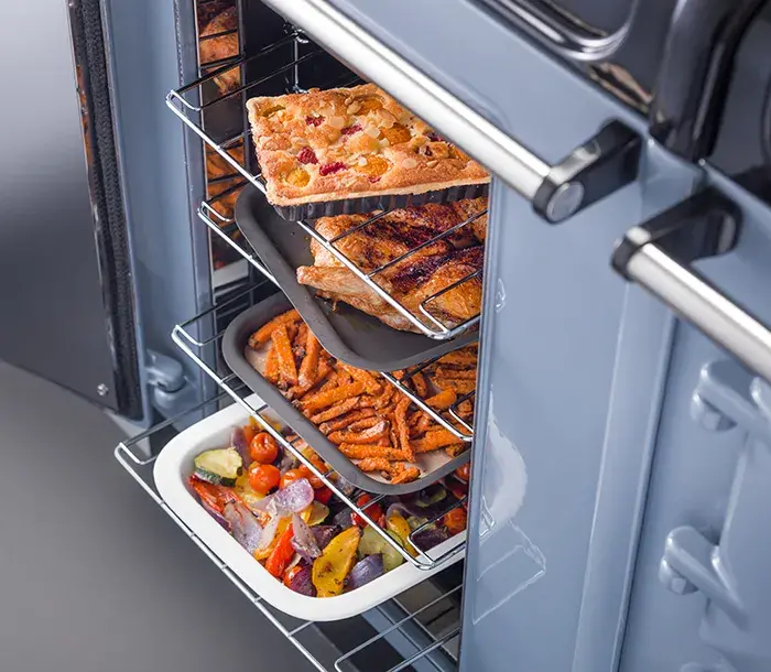Conventional fan oven in dove with pizza cooking 