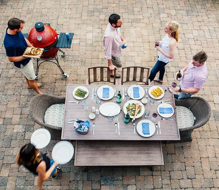 Outdoor dining area with Kamado Joe grill 