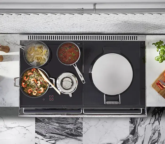 Food cooking on the new glass AGA ERA - Overhead shot