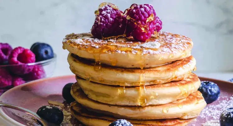 American Pancakes stack with raspberries and blackberries