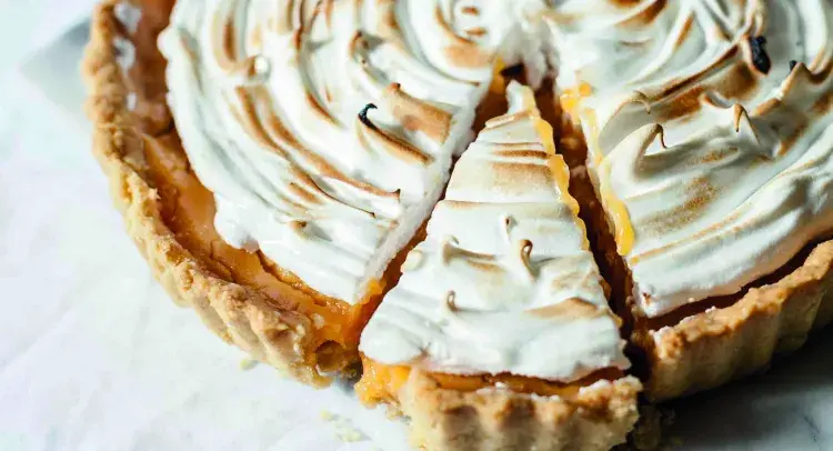 Lemon Meringue Pie with slice cut out