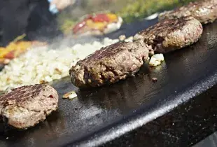 Beef Burgers cooking on the AGA Professional Series Outdoor Grill